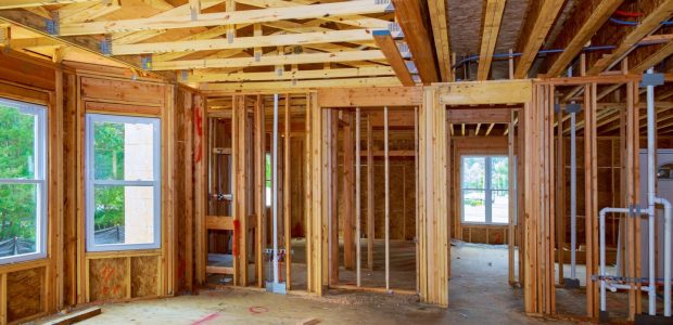 new-construction-wood-home-framing-abstract-new-construction-home-framing-e1600423536358.jpg